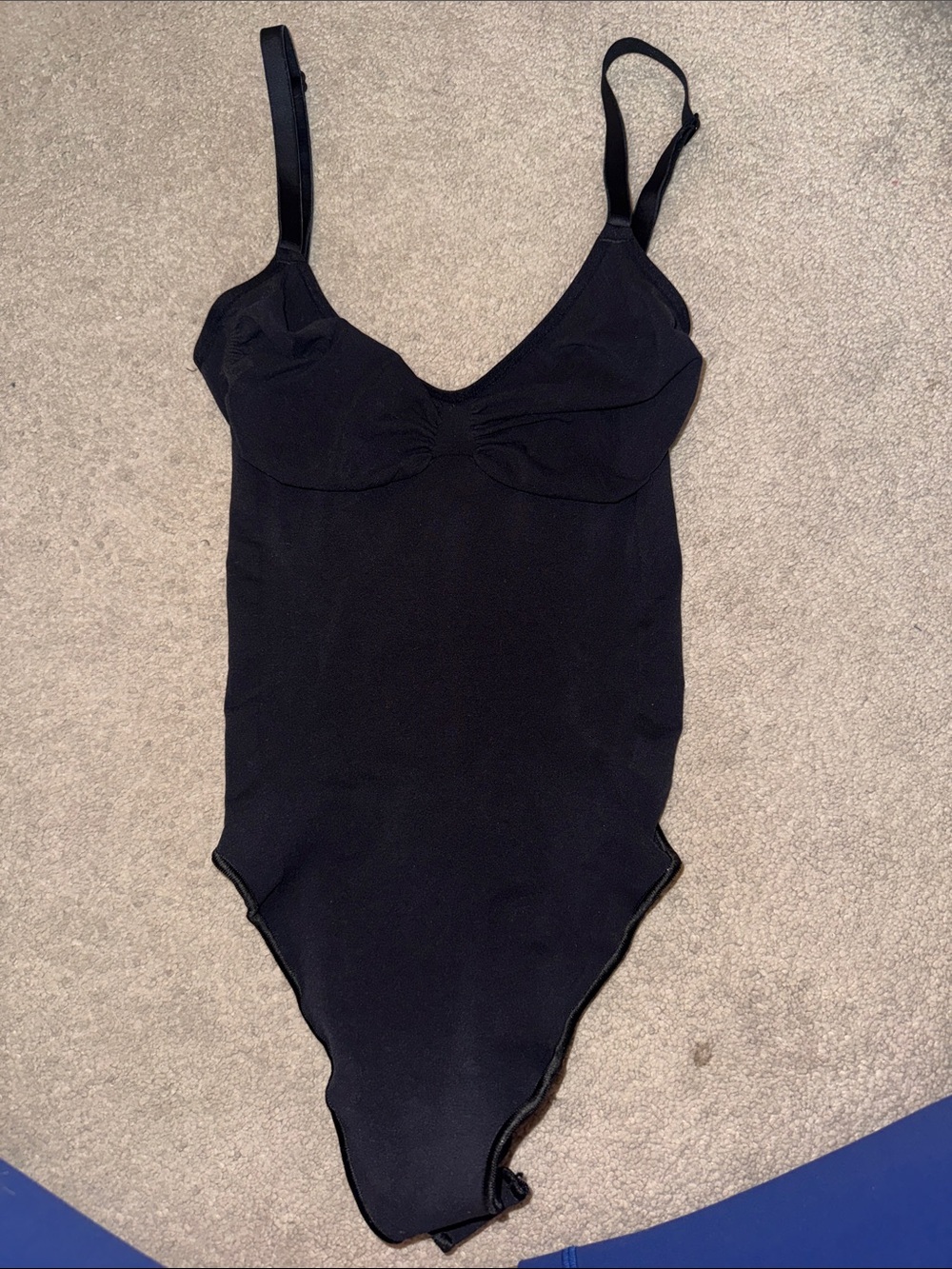 Seamless sculpt skims body suit size large